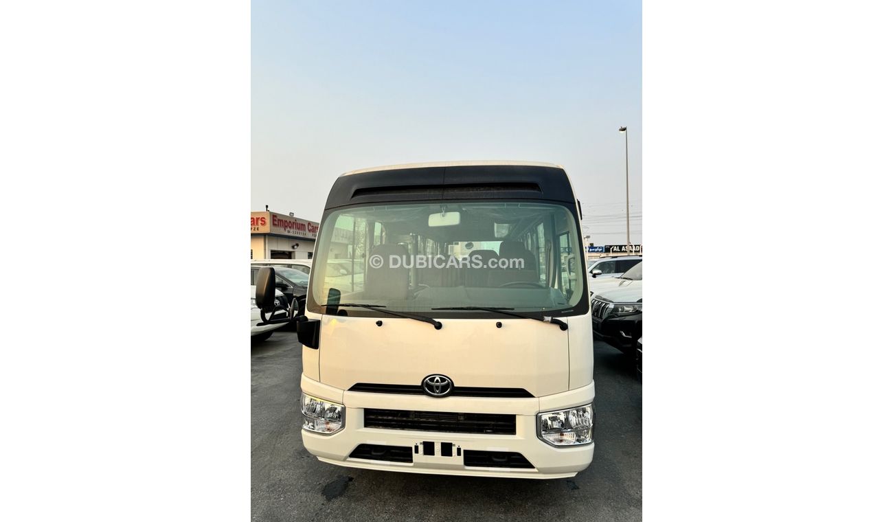 Toyota Coaster 2024 TOYOTA COSTER 4.0L DIESEL WITH COOLBOX, LUGGAGE RACK, CURTAINS, 22 SEATS MT