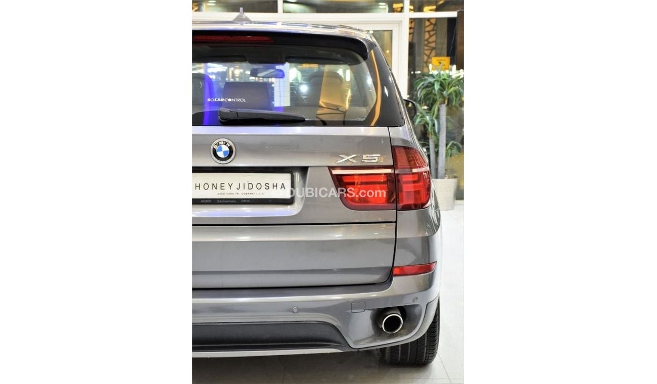 BMW X5 EXCELLENT DEAL for our BMW X5 xDrive35i ( 2011 Model! ) in Grey Color! GCC Specs