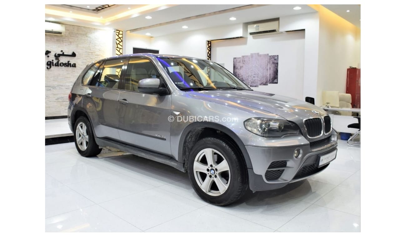 BMW X5 EXCELLENT DEAL for our BMW X5 xDrive35i ( 2011 Model! ) in Grey Color! GCC Specs