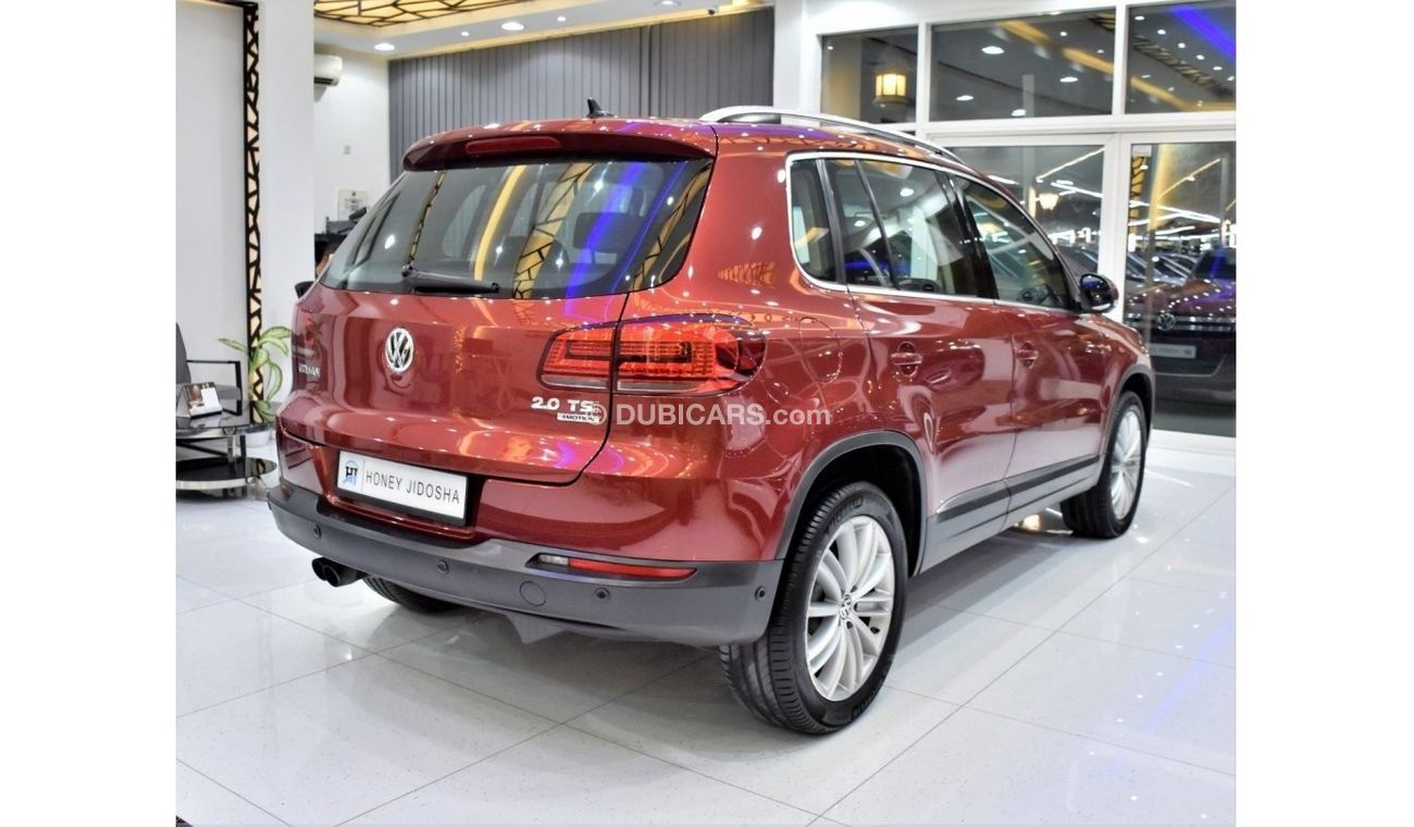 Volkswagen Tiguan EXCELLENT DEAL for our Volkswagen Tiguan 2.0 TSi 4Motion ( 2015 Model ) in Red Color GCC Specs