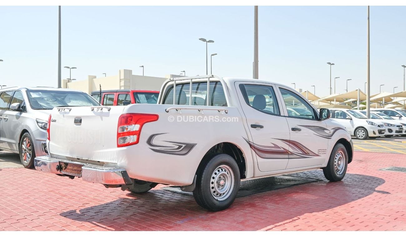 Mitsubishi L200 2016 | MITSUBISHI L200 4X2 | PICKUP DOUBLE CABIN | 6-SEATER | 4-DOORS | GCC | VERY WELL-MAINTAINED |