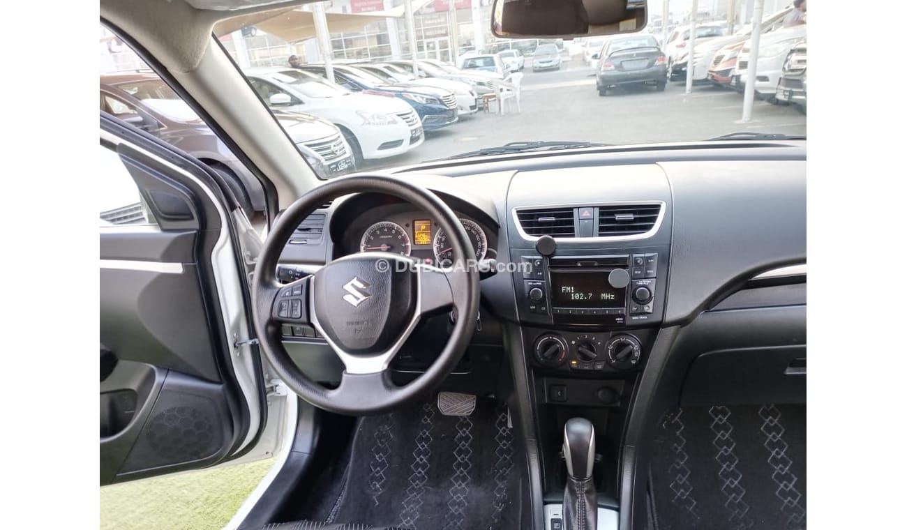 Suzuki Swift Gulf model 2014, center look, rims, air conditioning, without accidents, in excellent condition, you