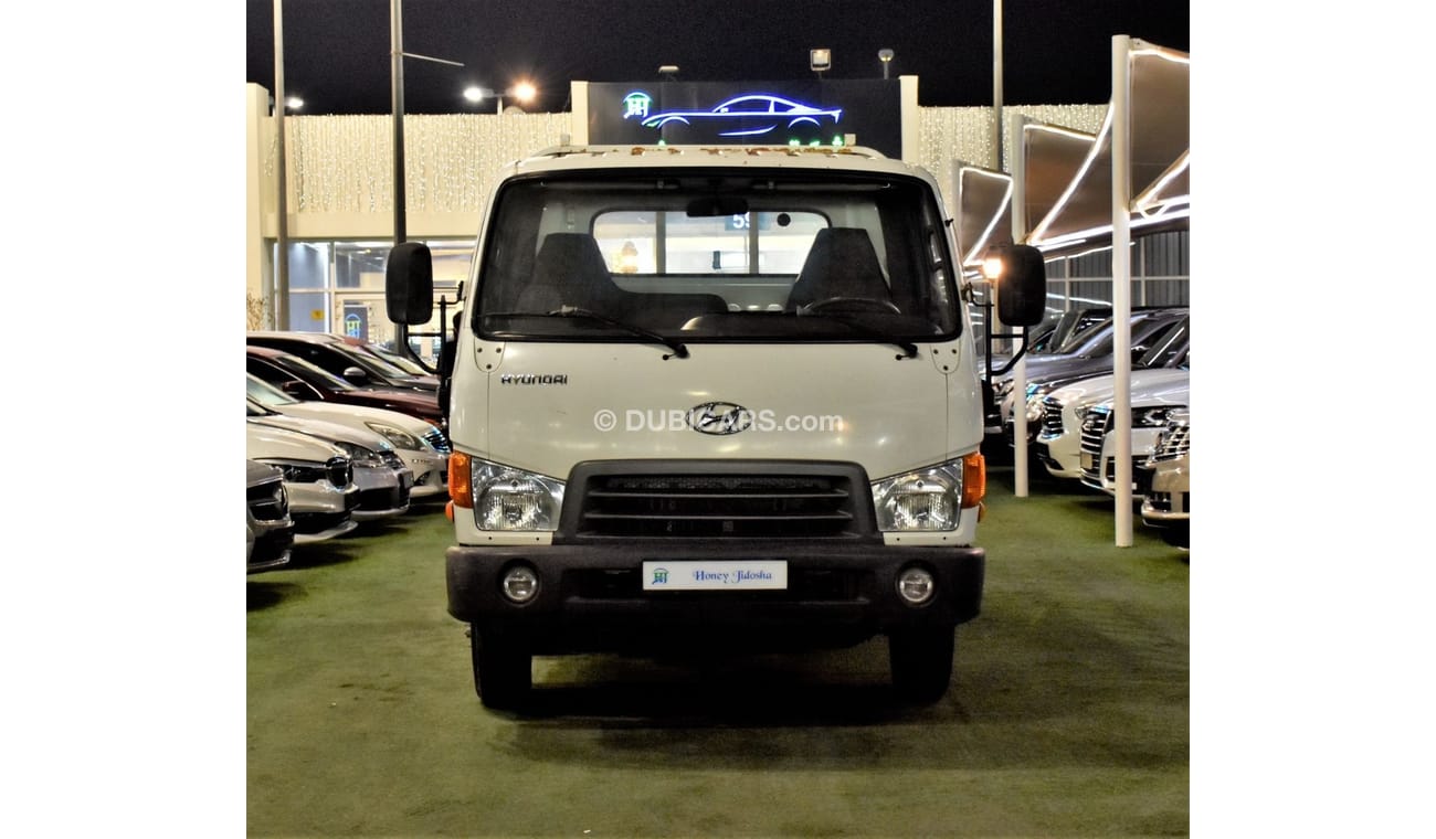 Hyundai HD 65 EXCELLENT DEAL for our Hyundai HD65 Utility Truck ( 2012 Model ) in Color GCC Specs