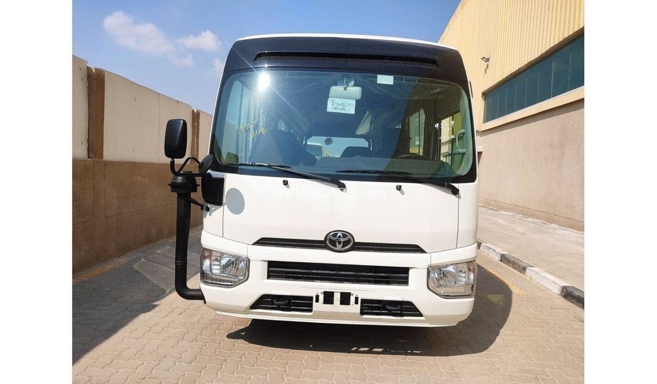 Toyota Coaster 4.2L MT Diesel 30 seaters Auto Door, snorkel, ABS, luggage carrier