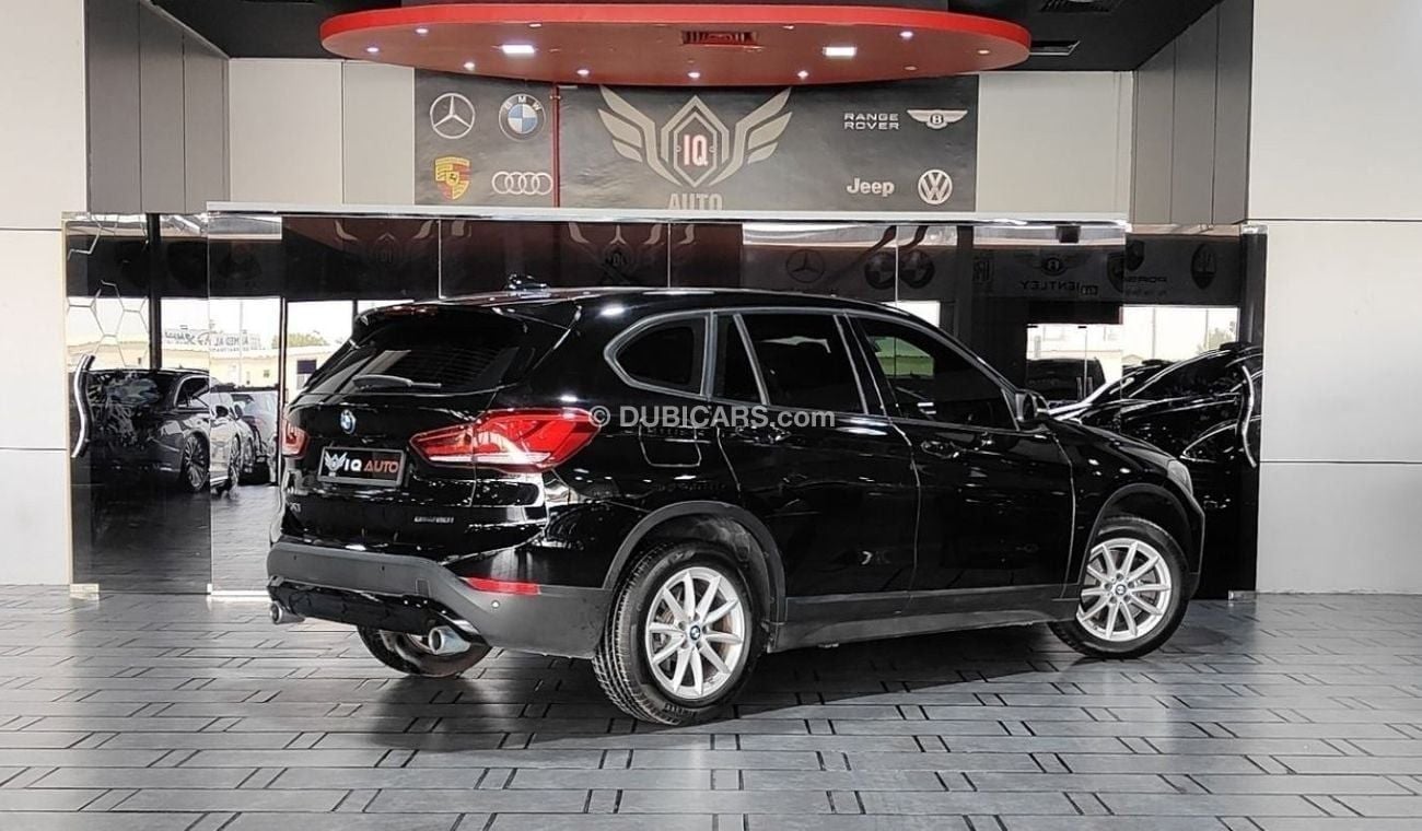 BMW X1 AED 1,300 P.M | 2022 BMW X1 | AGMC WARRANTY AND SERVICE CONTRACT | GCC | S-DRIVE20i FULL