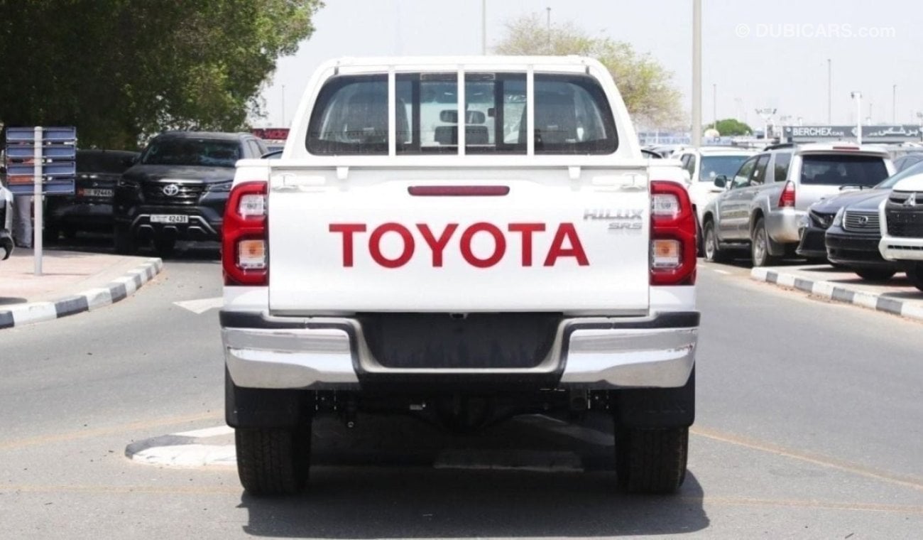 تويوتا هيلوكس 2.4L diesel  . White 2023 model, M/T Wide body with Chrome bumper