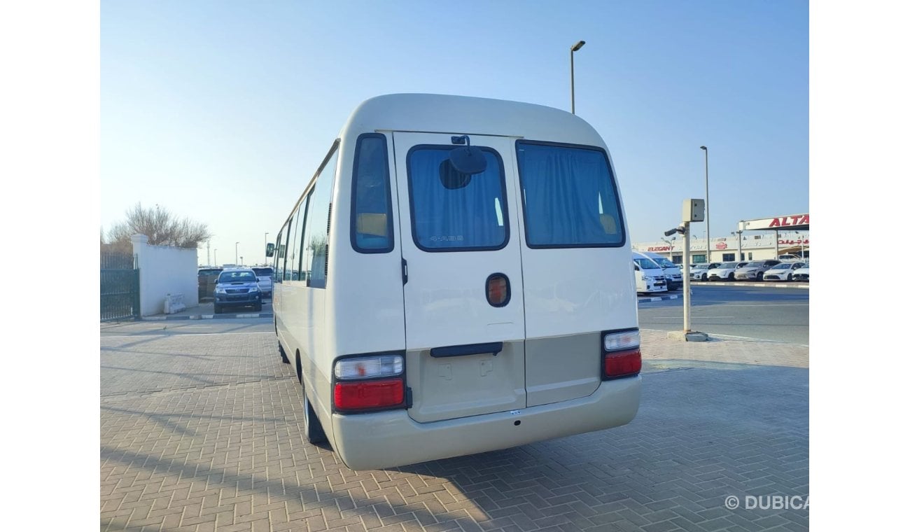 Toyota Coaster JTGEC538405000309 || 2008 WHITE GREY	4000	DIESEL	261785	RHD	MANUAL RIGHT HAND DRIVE.