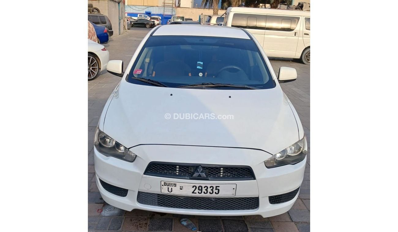 Mitsubishi Lancer For Local 2.0L FWD white color A/T