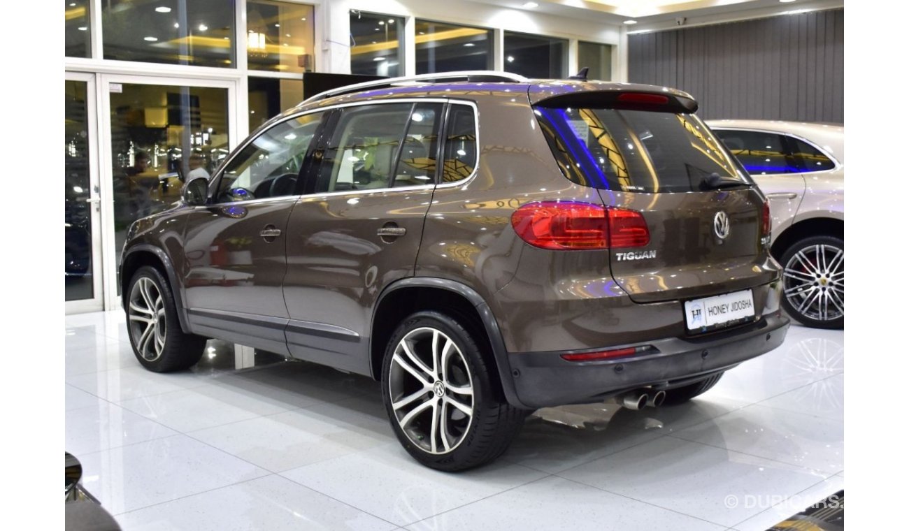 Volkswagen Tiguan EXCELLENT DEAL for our Volkswagen Tiguan 2.0 TSi 4Motion ( 2014 Model ) in Brown Color GCC Specs