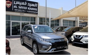 ميتسوبيشي آوتلاندر PHEV إنستايل بريميوم خليجي - خالية من الحوادث - رقم واحد الفل - هايبرد - بحالة الوكالة من الداخل وال