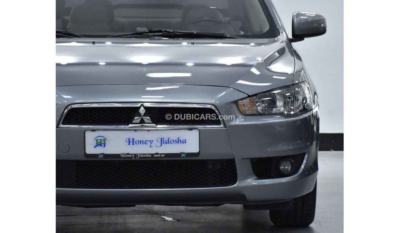 Mitsubishi Lancer EXCELLENT DEAL for our Mitsubishi Lancer EX GLS ( 2016 Model ) in Grey Color GCC Specs