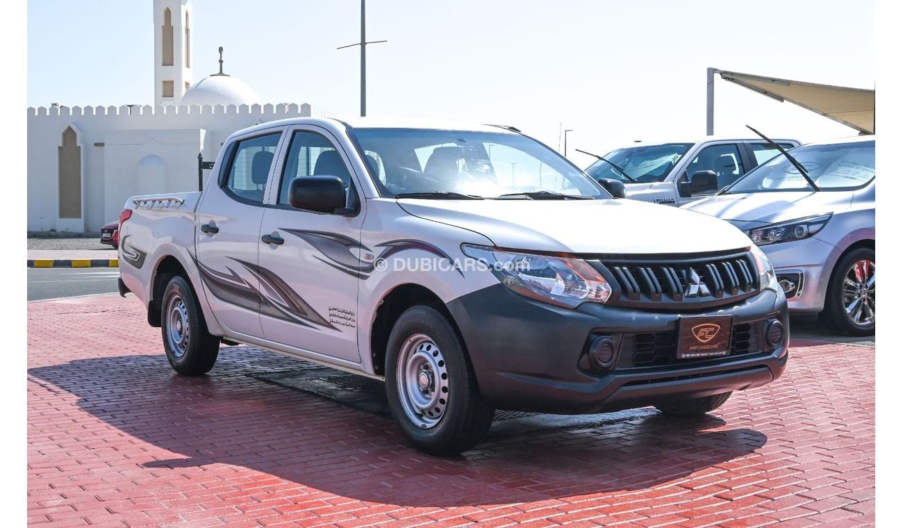 Mitsubishi L200 2016 | MITSUBISHI L200 4X2 | PICKUP DOUBLE CABIN | 6-SEATER | 4-DOORS | GCC | VERY WELL-MAINTAINED |