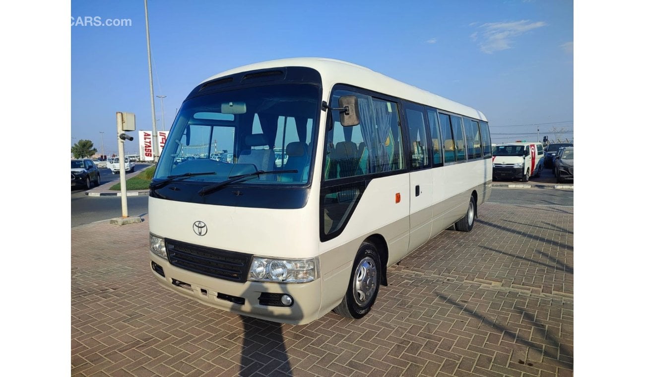 Toyota Coaster JTGEC538405000309 || 2008 WHITE GREY	4000	DIESEL	261785	RHD	MANUAL RIGHT HAND DRIVE.