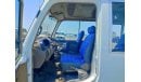 Toyota Coaster JTB43PB51W6000527 || TOYOTA COASTER (BUS) ||  2009 WHITE/BLUE MANUAL || LEFT HAND DRIVE ||