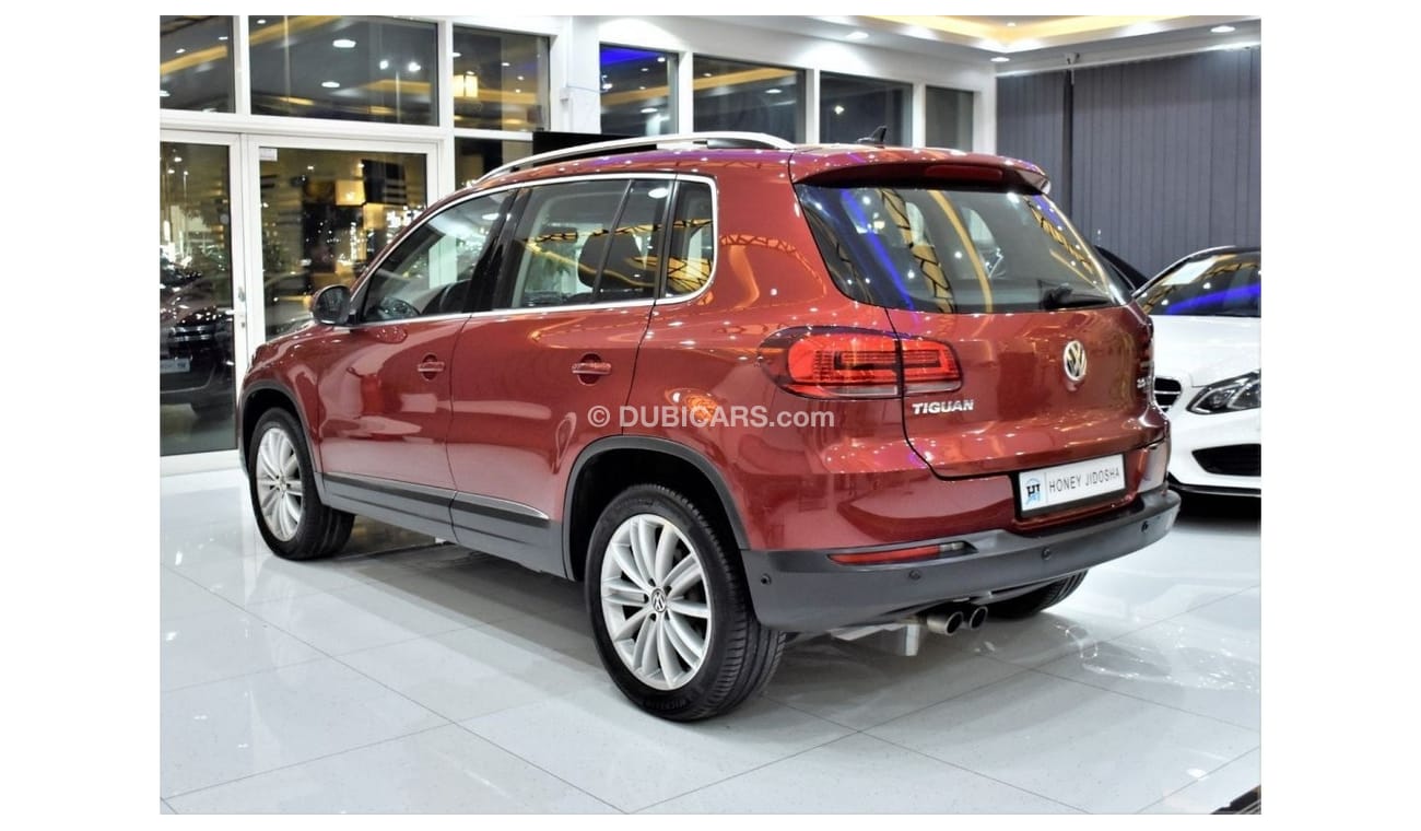 Volkswagen Tiguan EXCELLENT DEAL for our Volkswagen Tiguan 2.0 TSi 4Motion ( 2015 Model ) in Red Color GCC Specs