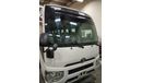 تويوتا كوستر B6-Level Armored 2024 Toyota Coaster 23-Seater High-Roof 4.2L 6-Cyl Diesel M/T RWD Export Only