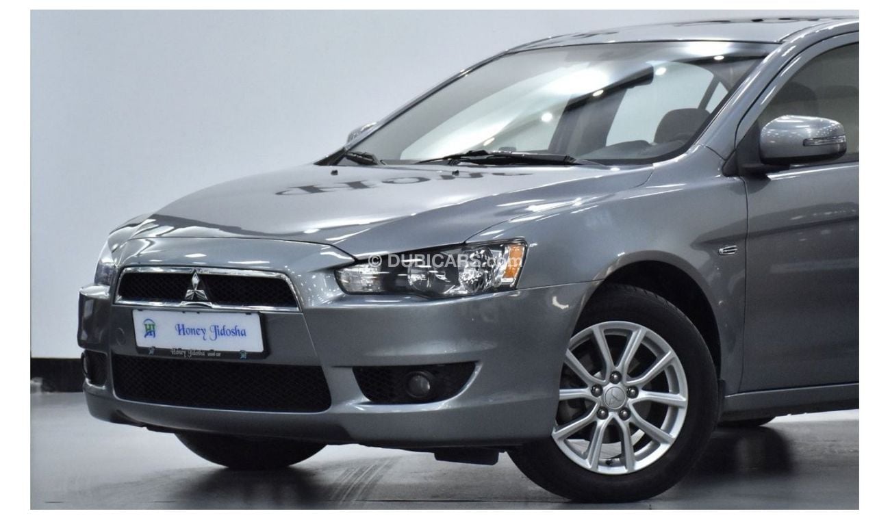 Mitsubishi Lancer EXCELLENT DEAL for our Mitsubishi Lancer EX GLS ( 2016 Model ) in Grey Color GCC Specs