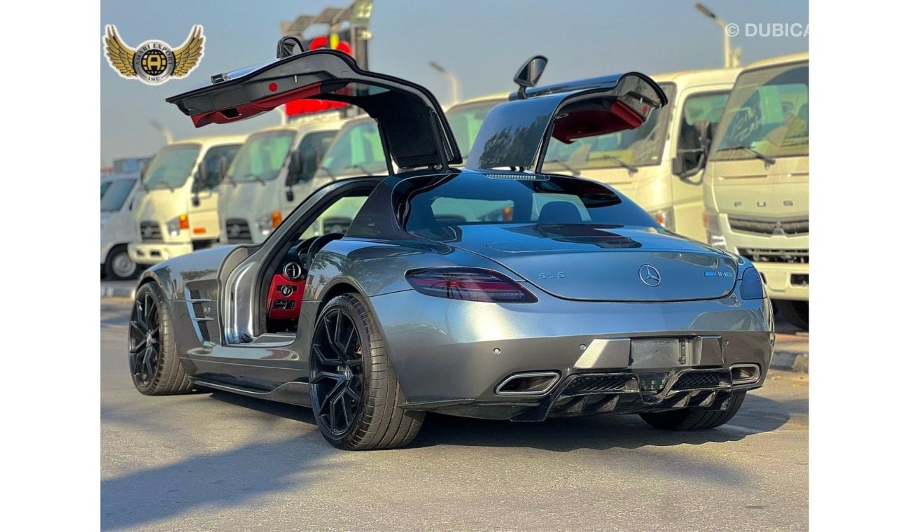 Mercedes-Benz SLS AMG Description For Sale: 2011 Mercedes-Benz SLS AMG Mileage: 21,000 km Exterior: Silver Interior: Red F