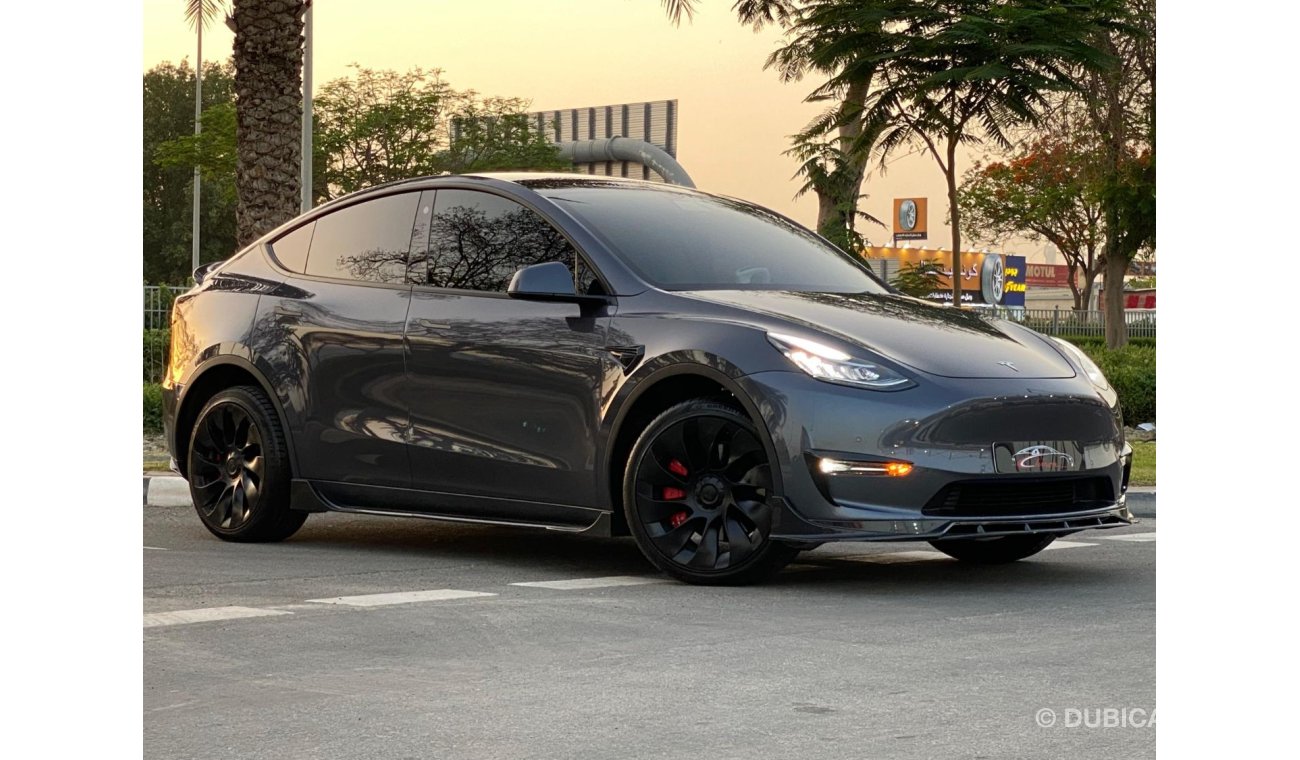 Tesla Model Y FULL BODY CARBON FIBER KIT - SPECIAL STEERING -WELL MAINTAINED