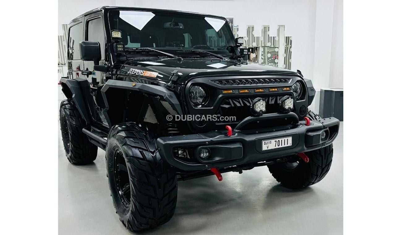 Jeep Wrangler Unlimited Sport GCC .. V6 .. Perfect Condition .. modified .. Manual