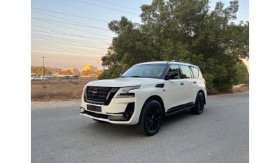 نيسان باترول Nissan patrol SE platinum/ V8/ 5.6  / model:2013 face lifted to 2022 in a good condition GCC full op