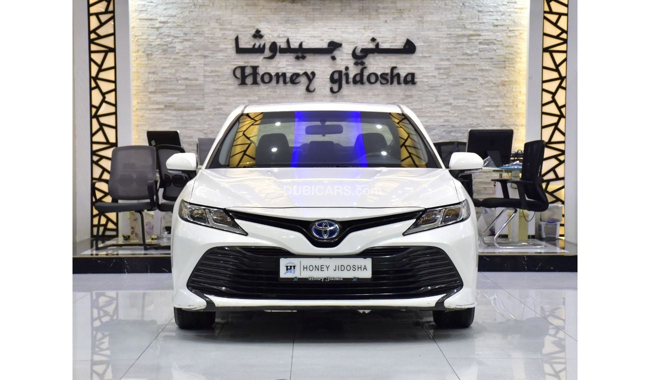 تويوتا كامري EXCELLENT DEAL for our Toyota Camry LE Hybrid ( 2019 Model ) in White Color GCC Specs