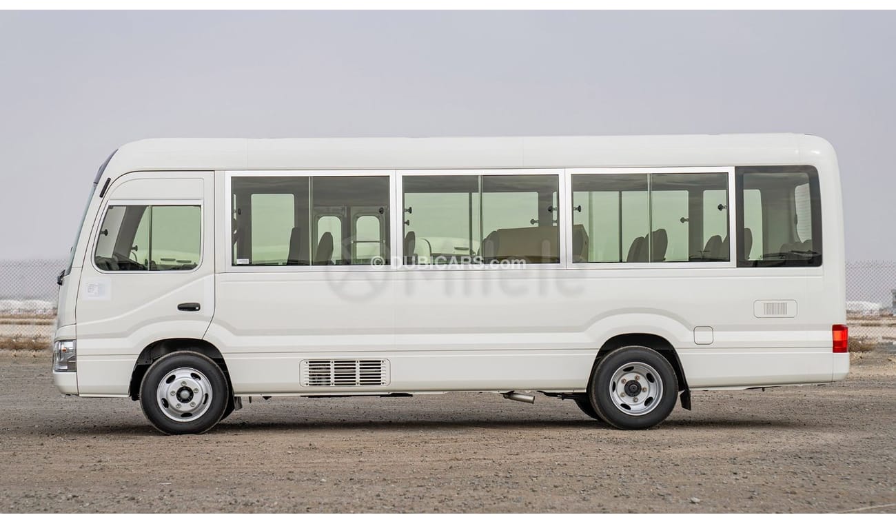 Toyota Coaster 2.7L PETROL 30-SEATER: WITH MANUAL AC, SNORKEL, AND ABS