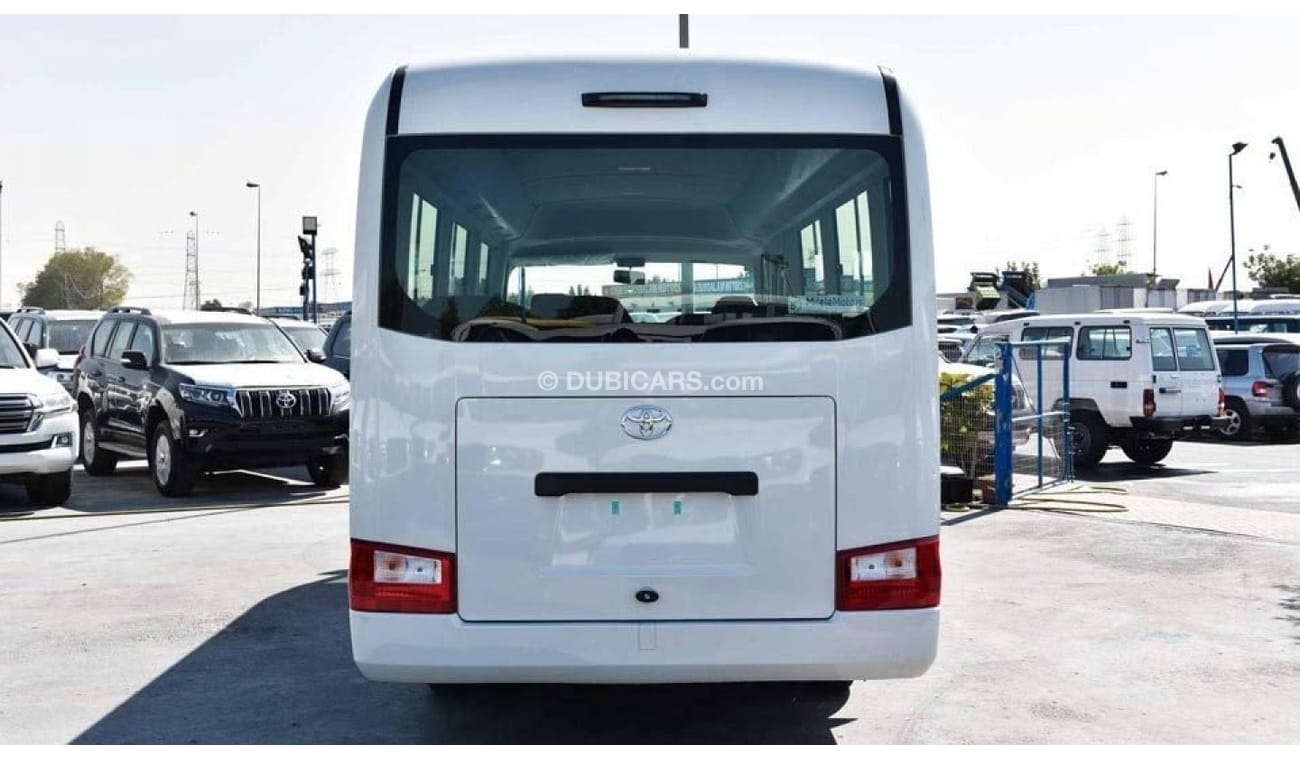 Toyota Coaster 4.2L DSL M/T 30 SEATER AUTO DOOR