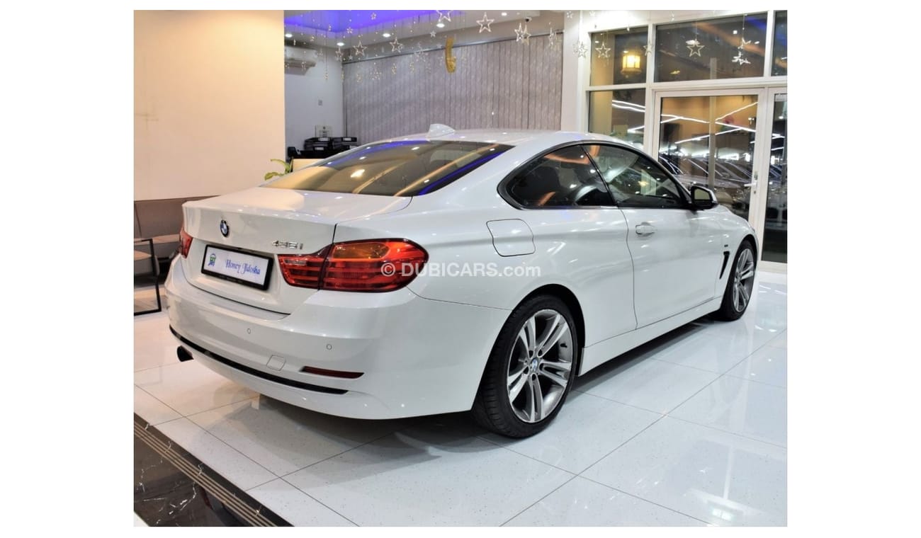 BMW 420i EXCELLENT DEAL for our BMW 420i Sport ( 435i Badge ) ( 2015 Model! ) in White Color! GCC Specs