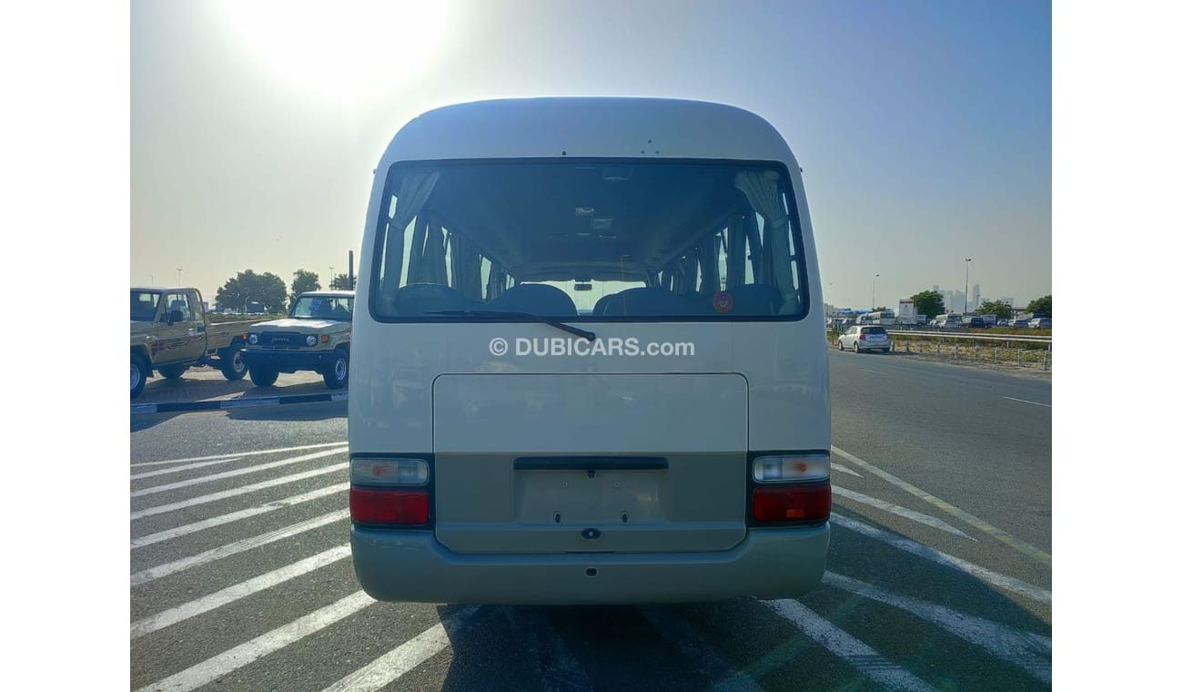 تويوتا كوستر HDB50-0002295 TOYOTA	COASTER (BUS)	CC4200	DIESEL RHD	AUTO	|| RHD