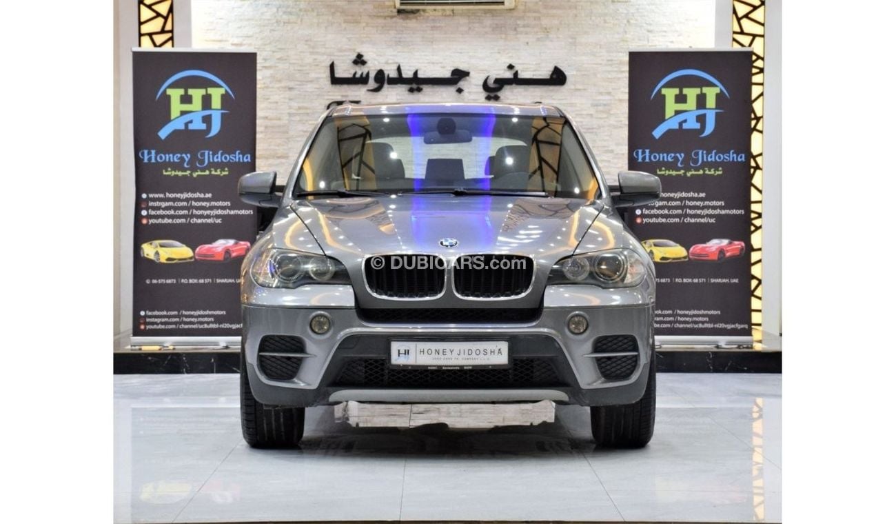 BMW X5 EXCELLENT DEAL for our BMW X5 xDrive35i ( 2011 Model! ) in Grey Color! GCC Specs