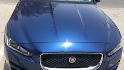 جاكوار XE Prestige model 2016 -luxury car with Fantastic Royal Blue Body ivory Leather - excellent condition