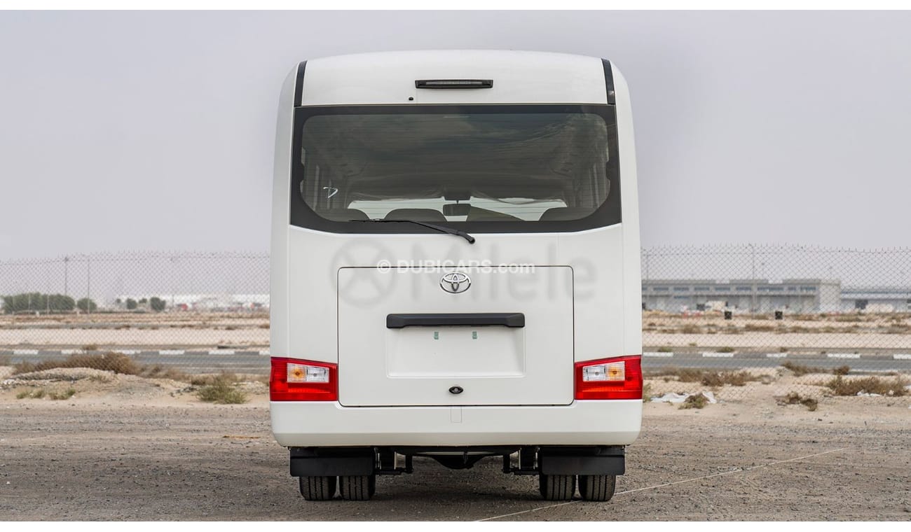 Toyota Coaster 2.7L PETROL 30-SEATER: WITH MANUAL AC, SNORKEL, AND ABS