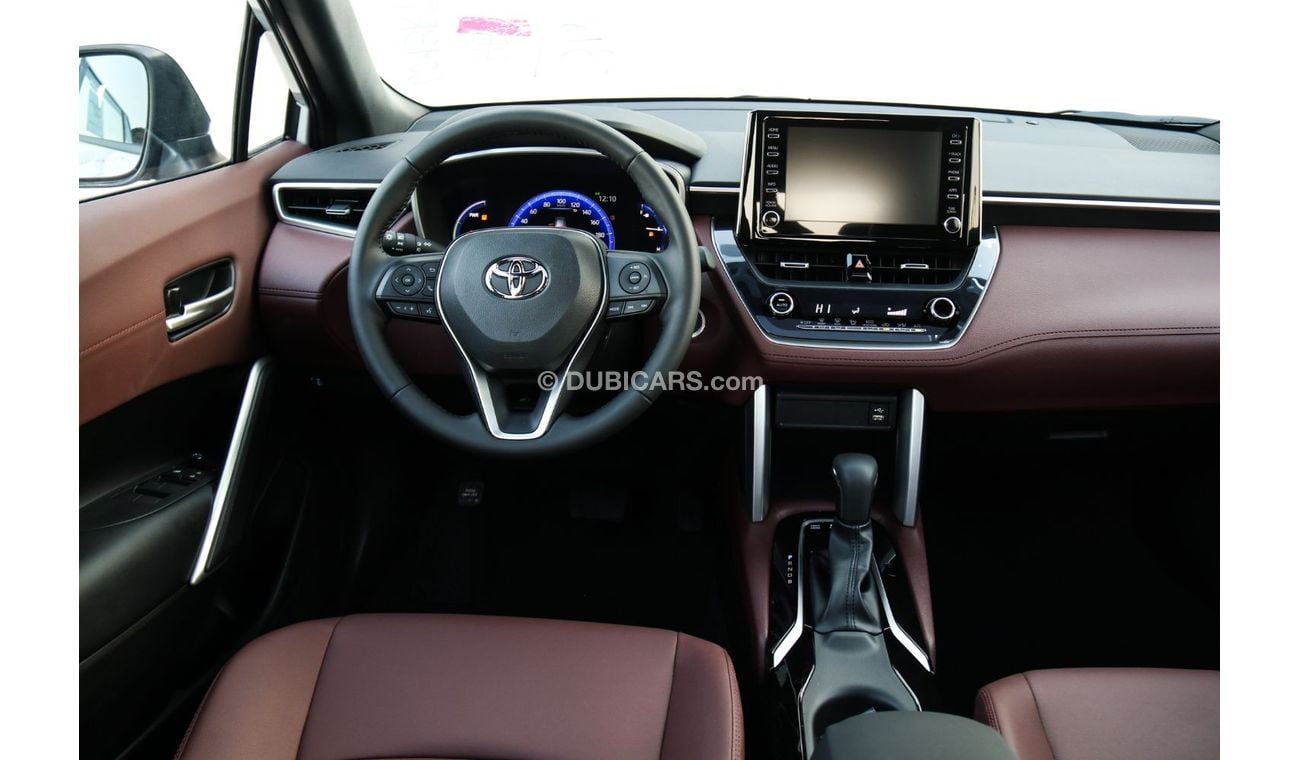 Toyota Corolla Cross Best offer for the new Corolla Cross Hybrid 2024 1.8L contact Now | Terra rosa color interior