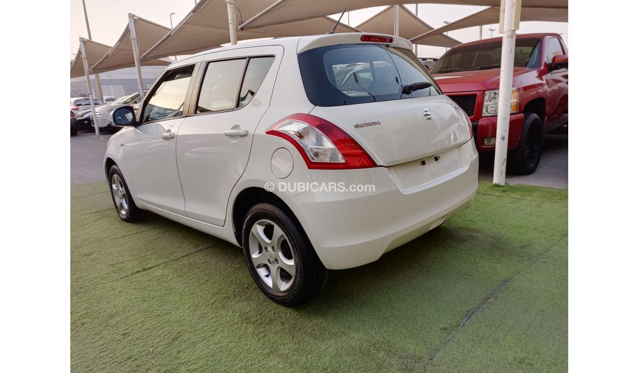 Suzuki Swift Gulf model 2014, center look, rims, air conditioning, without accidents, in excellent condition, you