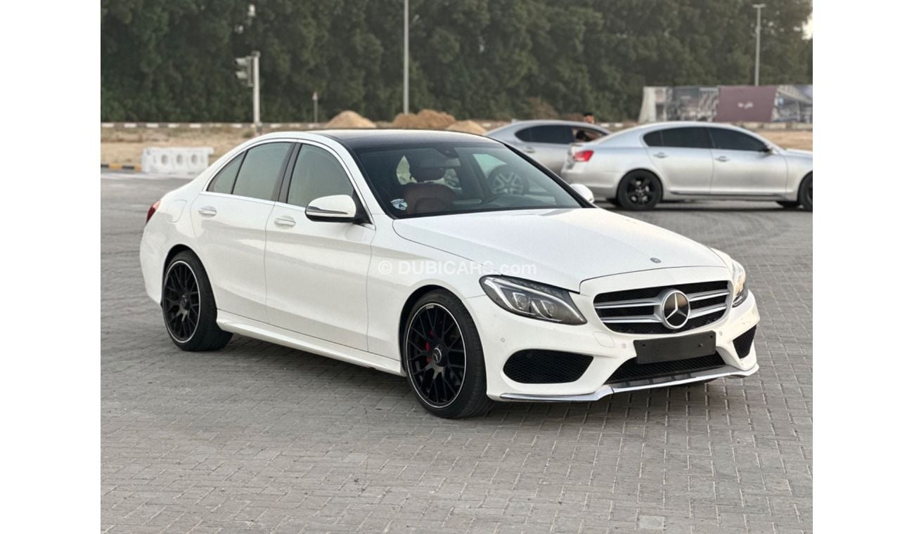 مرسيدس بنز C200 MODEL 2016 GCC CAR PERFECT CONDITION FULL OPTION PANORAMIC ROOF AMG