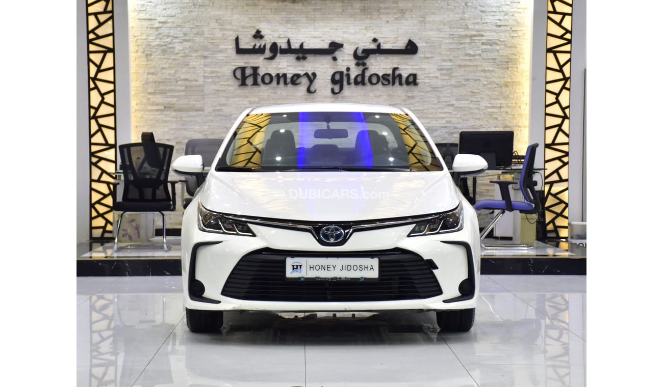 Toyota Corolla EXCELLENT DEAL for our Toyota Corolla Hybrid ( 2021 Model ) in White Color GCC Specs