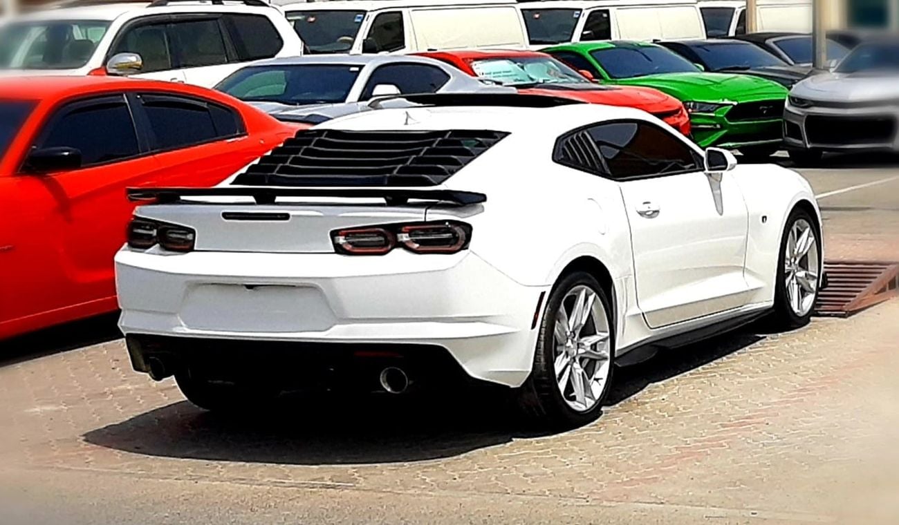 Chevrolet Camaro Chevrolet Camaro rs Model - 2021 Engine - v6 3.6L automatic gear Mileage - 13,000 White color Interi