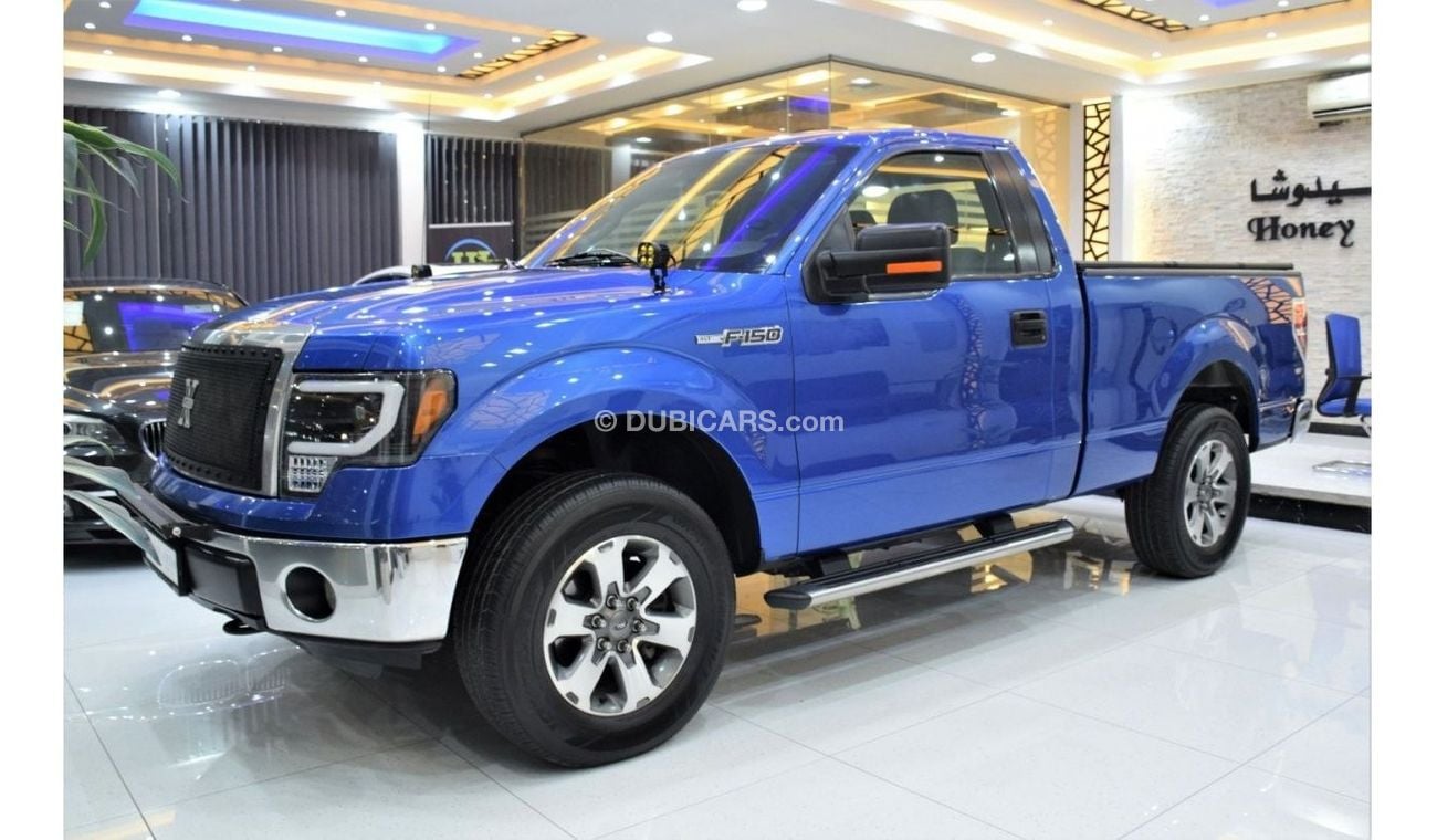 Ford F 150 XLT EXCELLENT DEAL for our Ford F-150 XLT 4x4 ( 2012 Model ) in Blue Color! GCC Specs