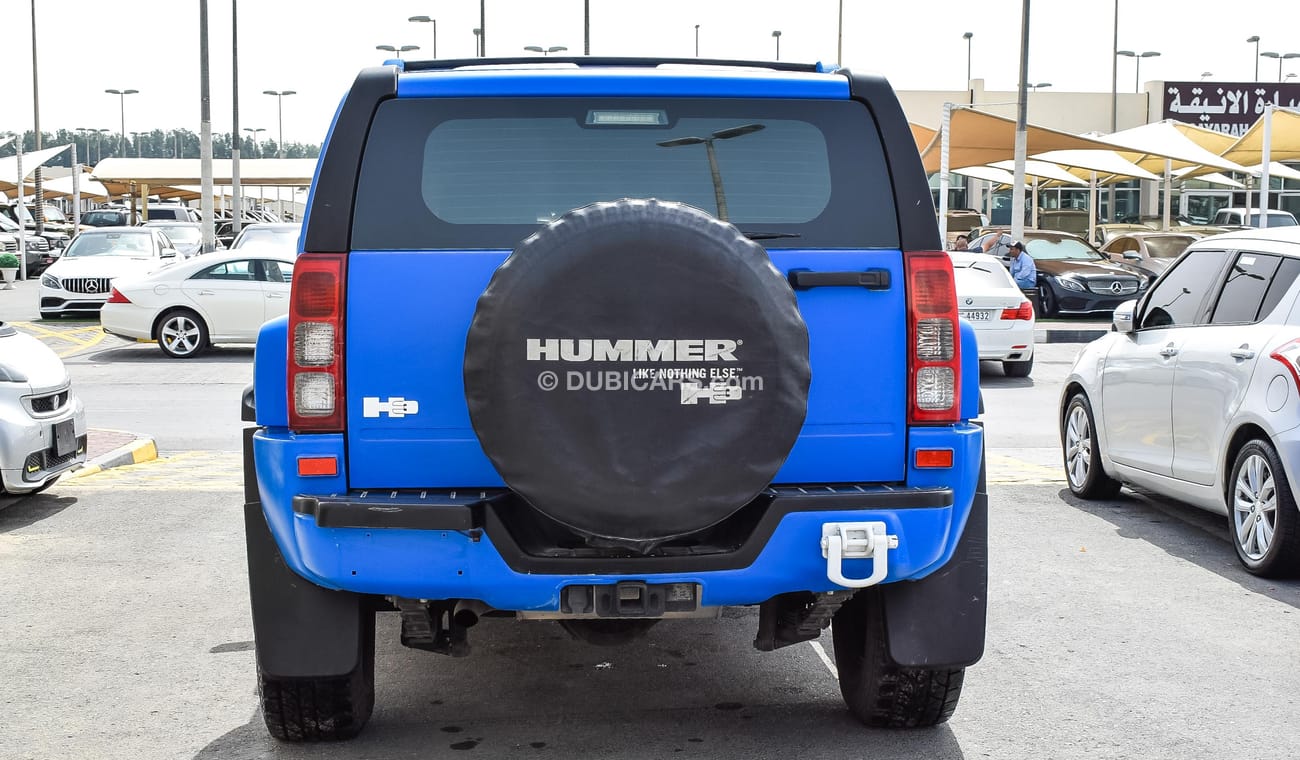 Hummer H3 White Color with blue wrapping