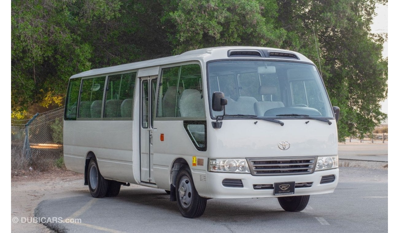 Toyota Coaster 2016 | TOYOTA COASTER | 23-SEATER | AUTOMATIC DOOR | GCC SPECS | T79591