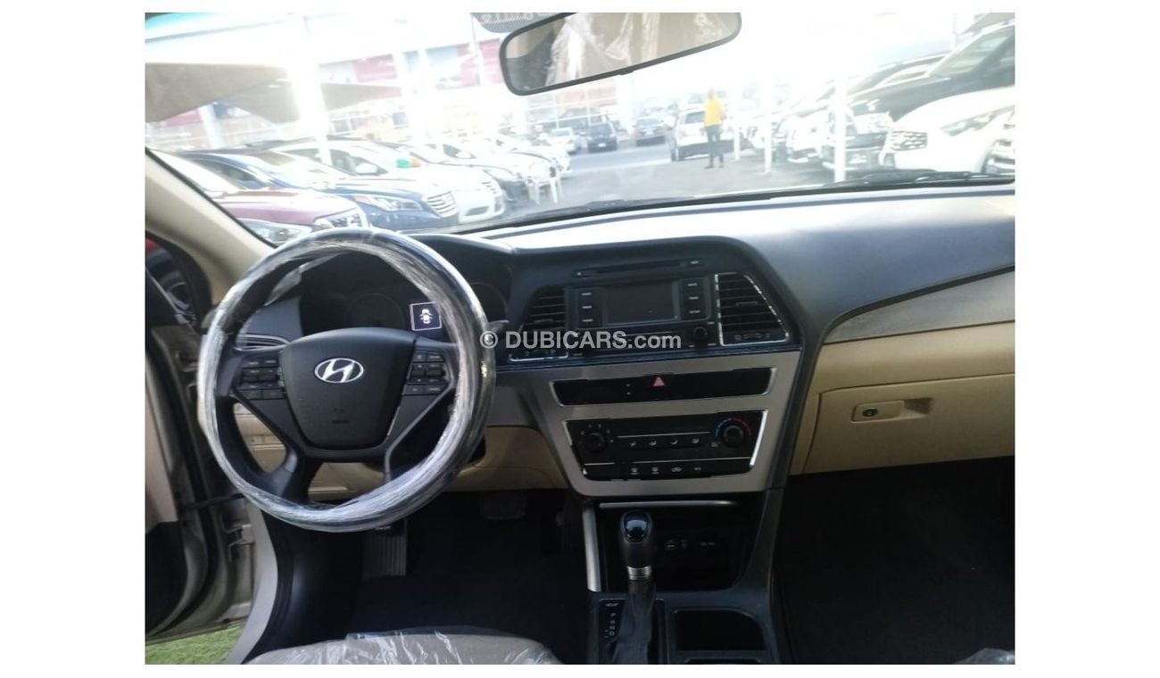 Hyundai Sonata 2016 Gulf model, cruise control, rear camera screen, front and rear air conditioning, alloy wheels i