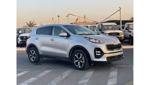 كيا سبورتيج 2021 Kia Sportage 2.4L V4 MidOption+ - AWD 4x4 - Apple & Android Play Full Serviced - 56000 mileage