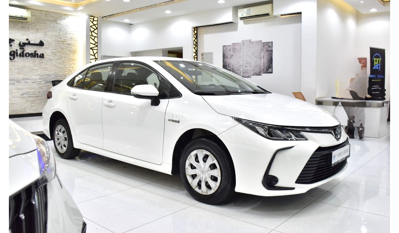 Toyota Corolla EXCELLENT DEAL for our Toyota Corolla Hybrid ( 2021 Model ) in White Color GCC Specs