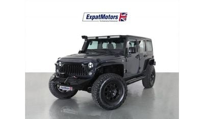 Jeep Wrangler Unlimited Sport 3.6L M/T Unlimited Sport 3.6L Manual• 1,895x60 • 0% DP • 2017 • Warranty • GCC •