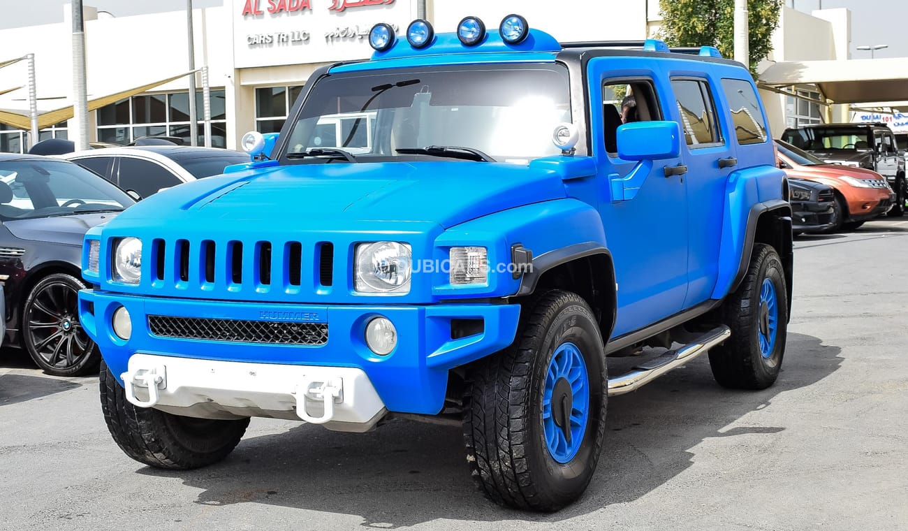 Hummer H3 White Color with blue wrapping