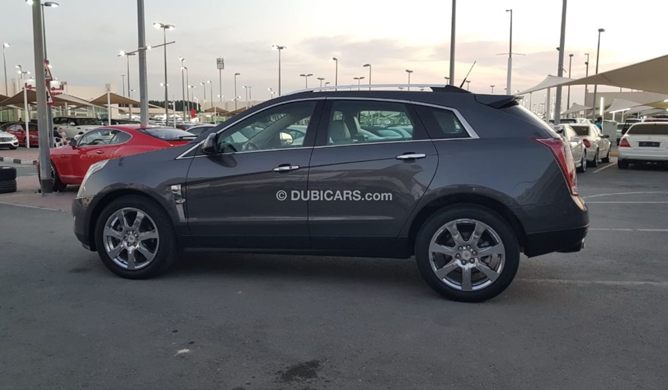 Cadillac SRX Caddillac SRX model 2011 GCC car prefect condition full option low mileage panoramic roof leather s