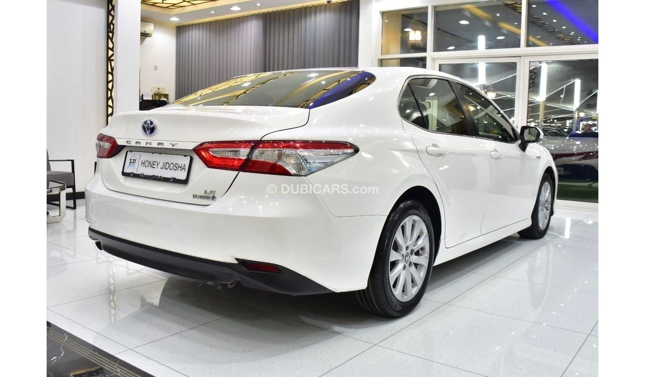 تويوتا كامري EXCELLENT DEAL for our Toyota Camry LE Hybrid ( 2019 Model ) in White Color GCC Specs