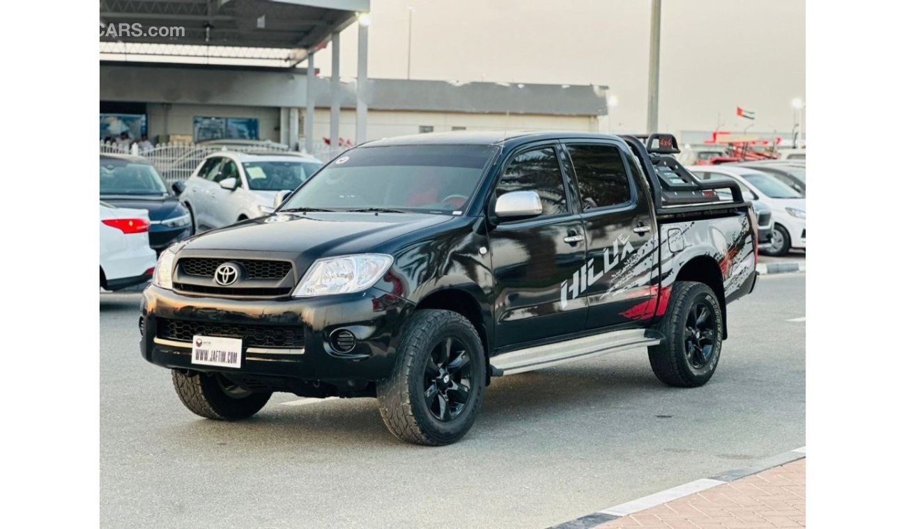 Toyota Hilux DOUBLE CABIN | PREMIUM SPORTS BAR WITH BASKET | 2009 | 2.7L PETROL | LHD | MANUAL | RED INTERIOR