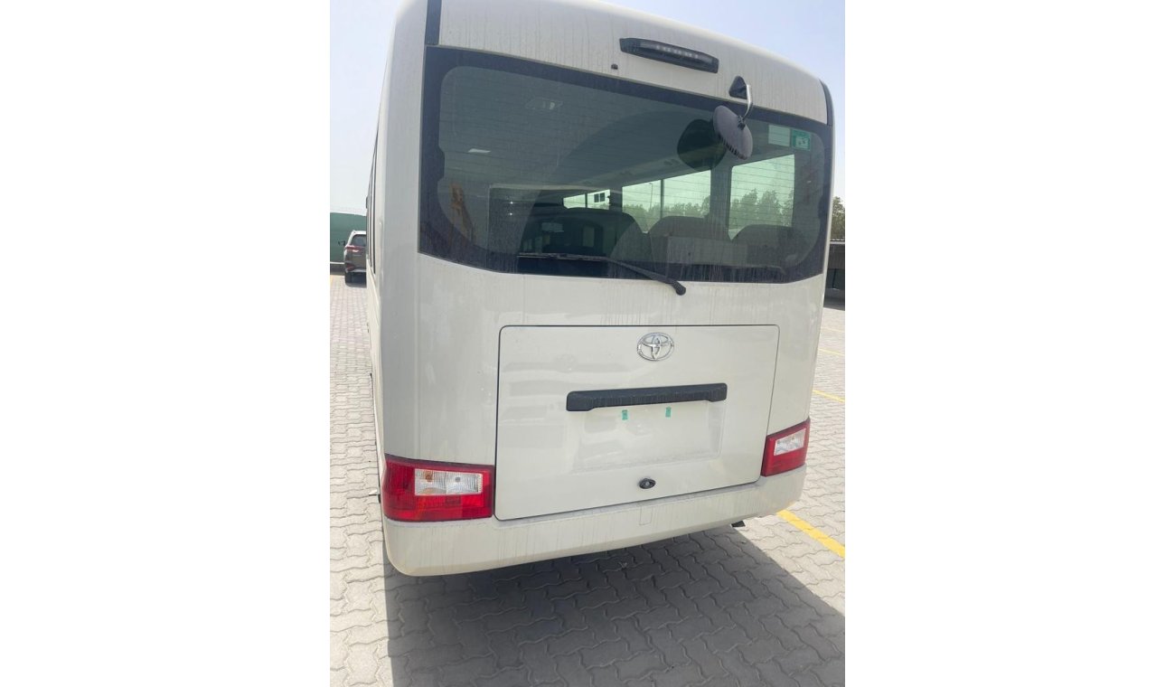 Toyota Coaster 4.2L DIESEL 23 SEATER WITH AUTO DOOR AND 3-P SEATBELT M/T, 2024 MODEL